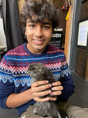 Kailash holding his dog