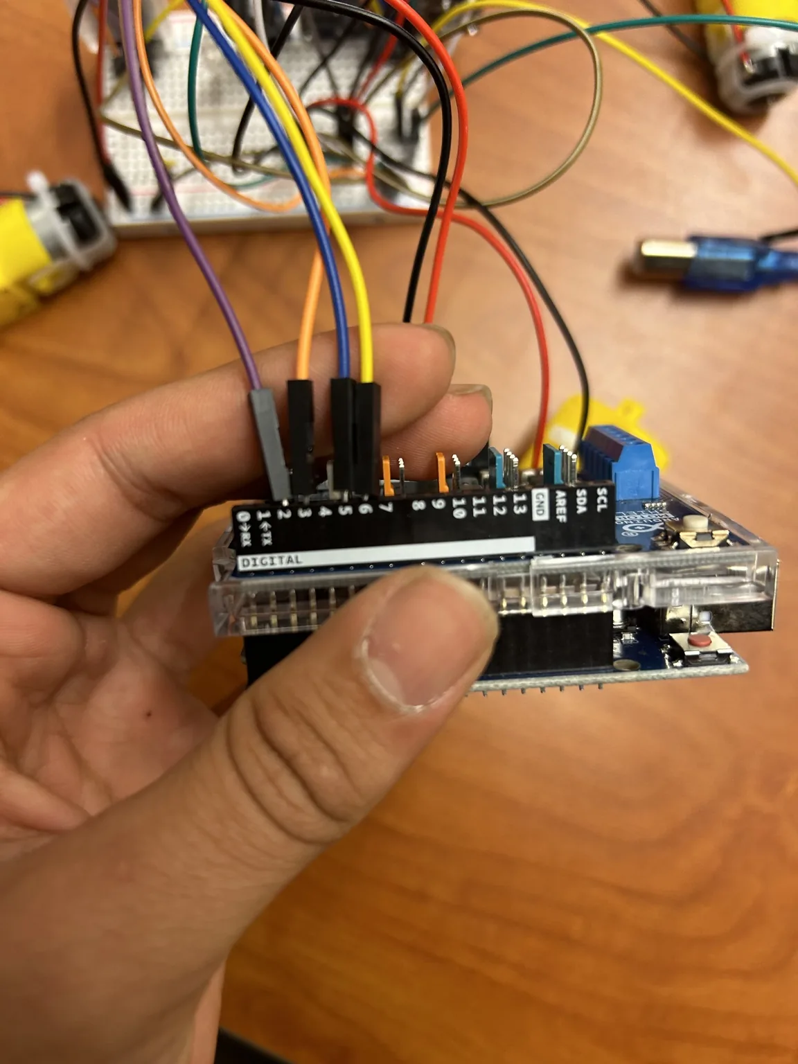 Close-up of the Arduino digital header and jumper-wire connections